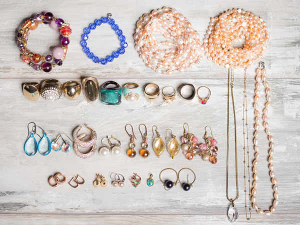 jewerly display with necklaces, braclets and earings